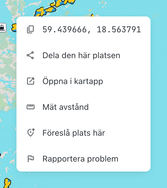 The map context menu: copy coordinates, share this place, open in a map app, measure distance, suggest a place, and report a problem.